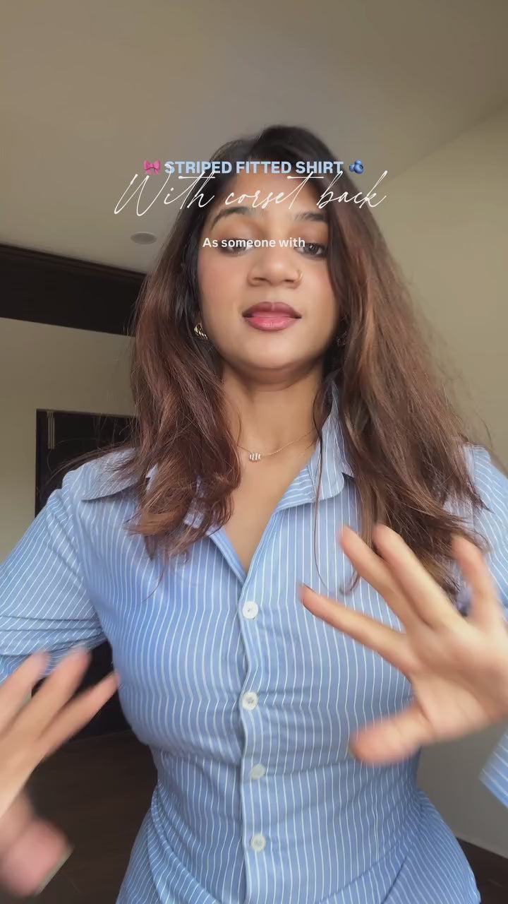 Load video: Premium cotton. Hidden buttons. Corset back.The shirt that shapes every curve.